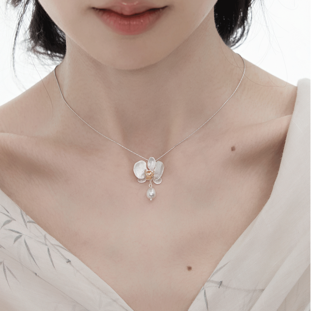 Botanical Realism Vintage Freshwater Pearl necklace worn by a model in a minimalist outfit.-2