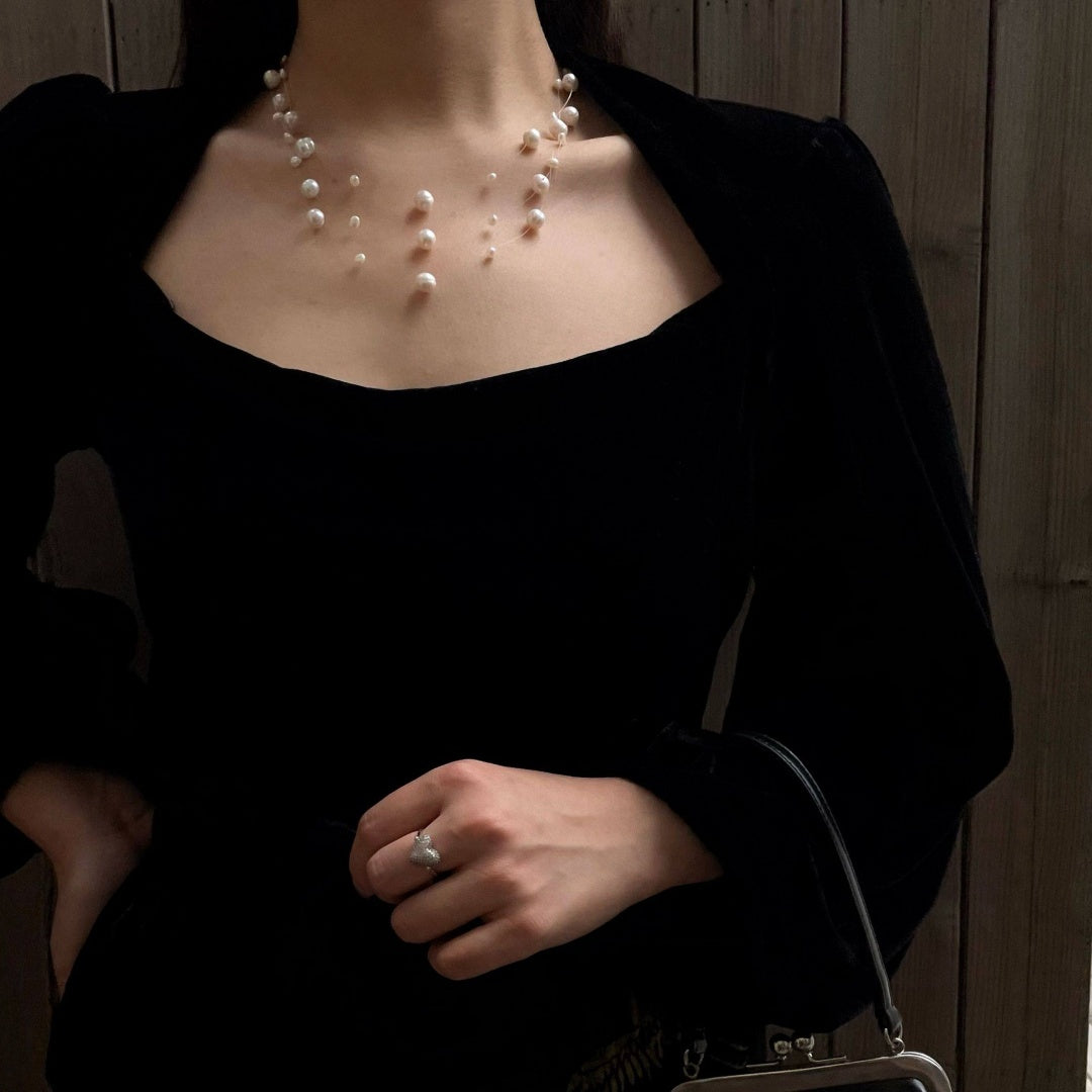 Illusion Floating Pearl elegant vintage natural freshwater pearl necklace enhancing neckline with a white romantic blouse - model-look-4