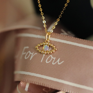 Gold Necklace Charm that brings good luck and joy. 