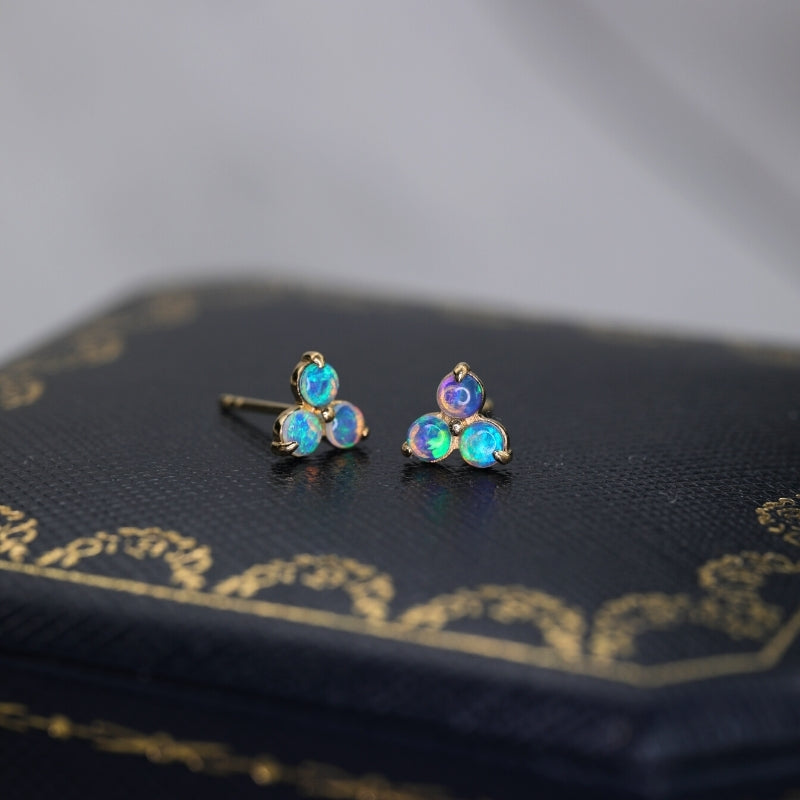 This pair of dainty stud earrings is made in solid 18K gold with genuine Australian opal gemstone, opal stone is October birth stone.