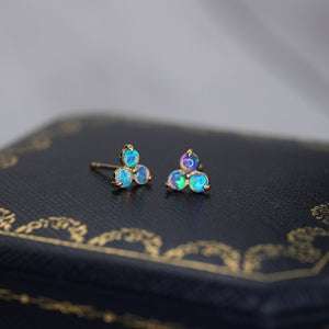 This pair of dainty stud earrings is made in solid 18K gold with genuine Australian opal gemstone, opal stone is October birth stone. 