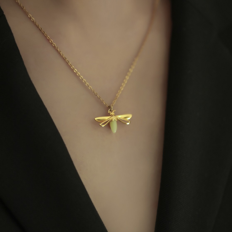 The Chubby Paw Jewelry Collection - Glow in the dark firefly necklace made with 925 sterling silver and natural fluorite gemstone.