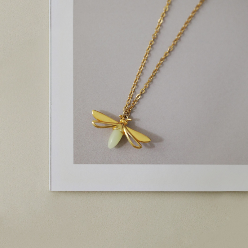 The Chubby Paw Jewelry Collection - Glow in the dark firefly necklace made with 925 sterling silver and natural fluorite gemstone.