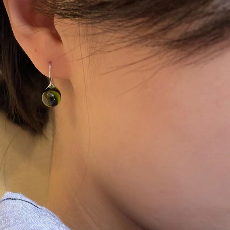 Japan Designer brand Knap handmade jewelry handcrafted glass stud earrings olive green.