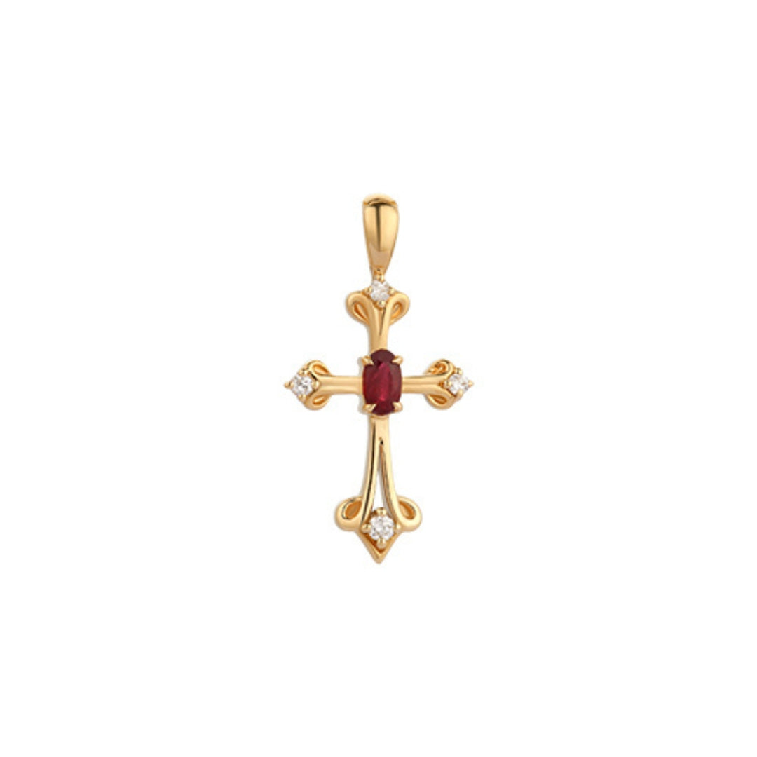 Gold cross pendant with a Mozambique ruby gemstone and diamond on a white background