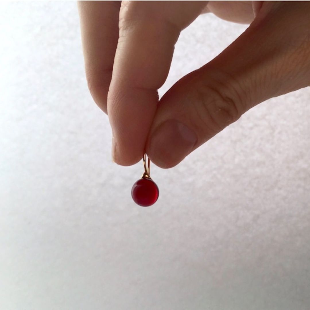 Handcrafted minimalist style round glass drop earrings in red color with 23K gold