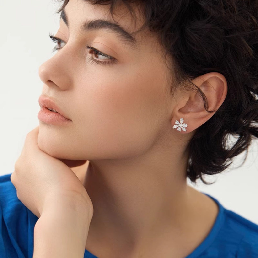 Iris petal botanical style S925 sterling silver stud earrings on model - Model look 1
