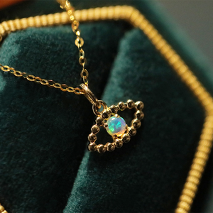 18K Yellow Gold Evil Eye charm necklace with Australian Opal Gemstone from The Chubby Paw.